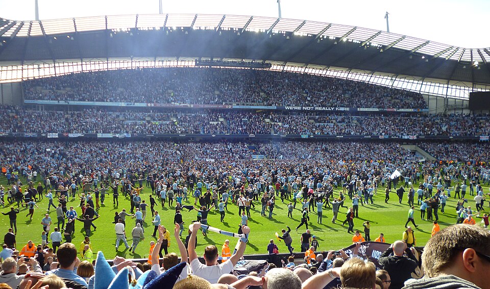 Manchester City pitch invasion after Premier League title win vs QPR