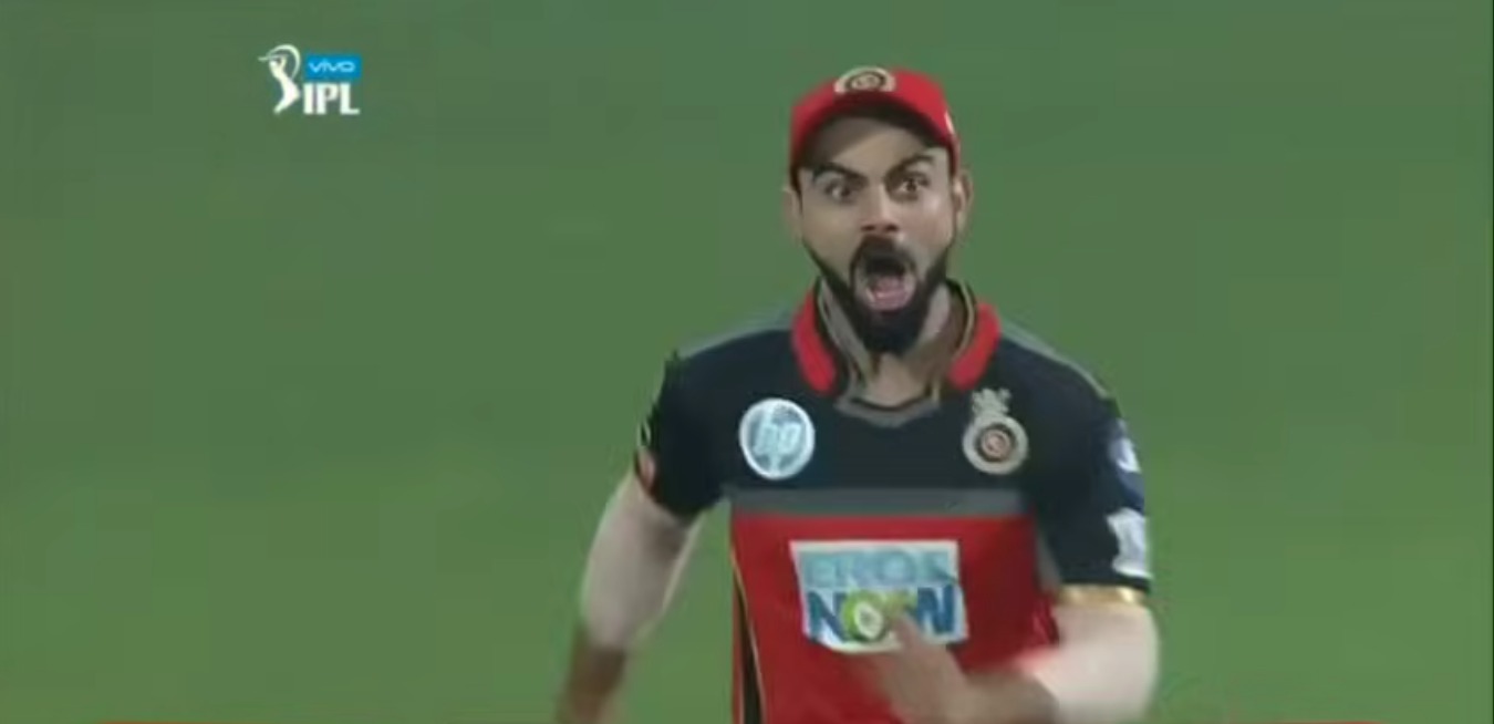 Virat Kohli’s shocked reaction after AB de Villiers takes an incredible one-handed catch during an IPL match for Royal Challengers Bangalore
